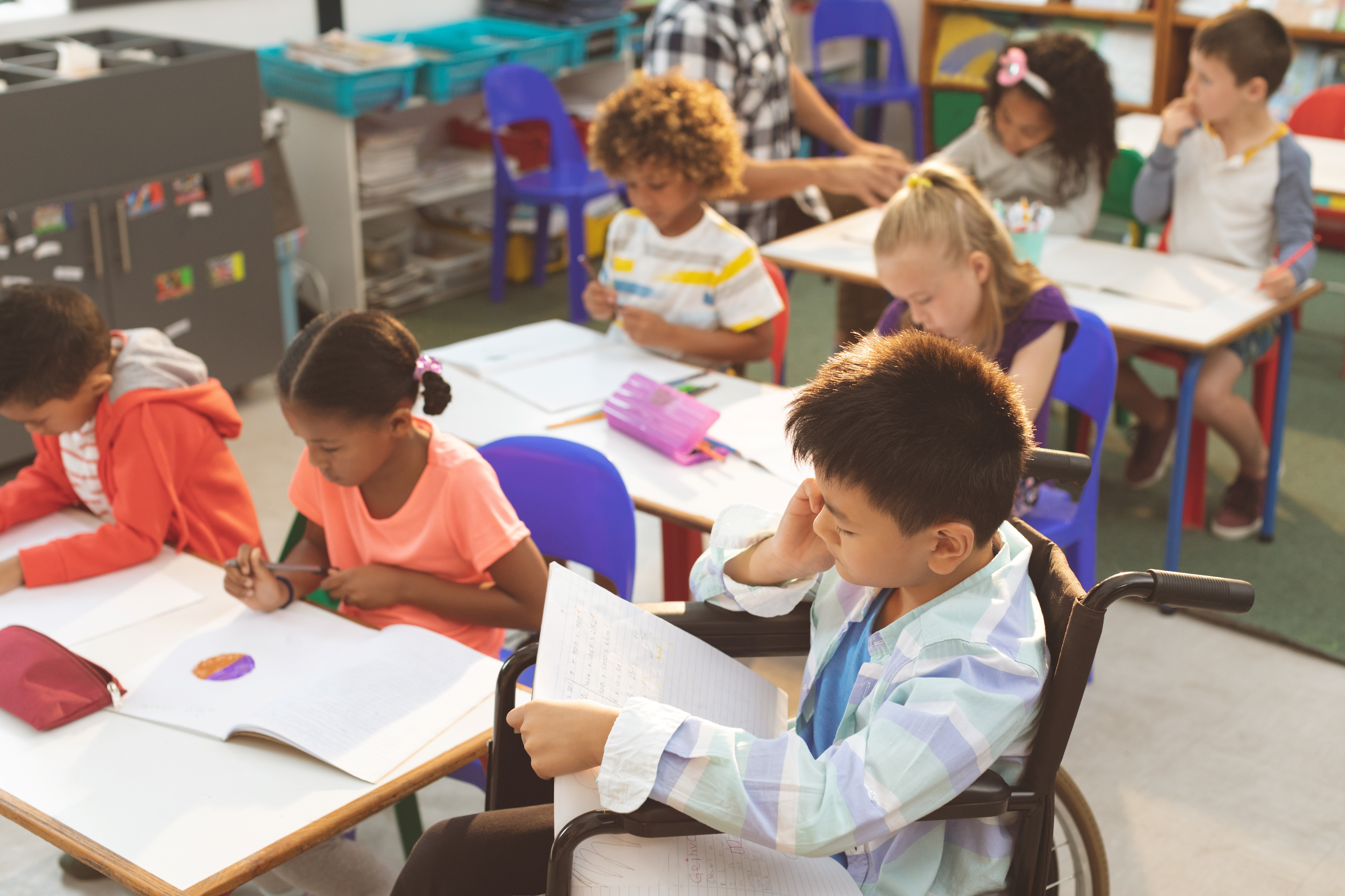 Children work in a classroom