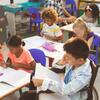 Children work in a classroom