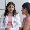 Doctor consulting with patient