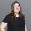 White woman wearing a black shirt 